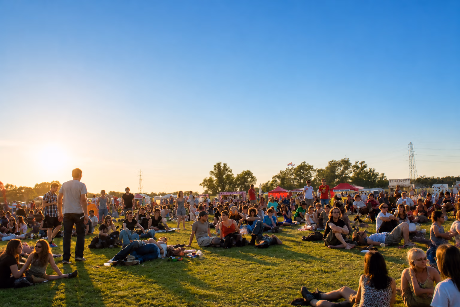 Fenland skyscape on a hot summer's day LodeStar Festival-goers enjoying the stage performances and tasty food and refreshing drinks.